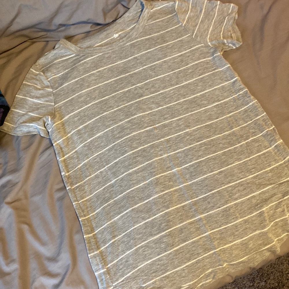 Cute top; size xs but fits bigger; $7
